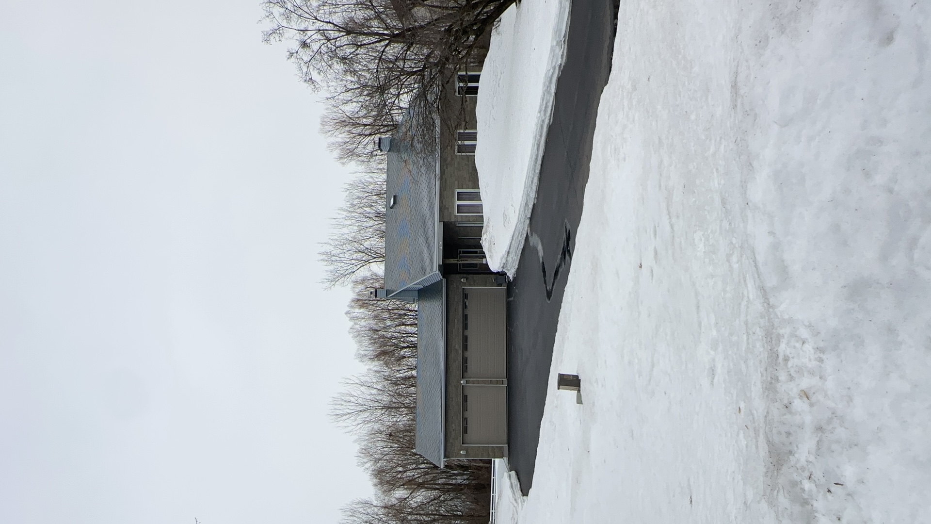 Interlock Aluminum Slate Metal Roofing – Charcoal Grey | Navan, ON (Street view)