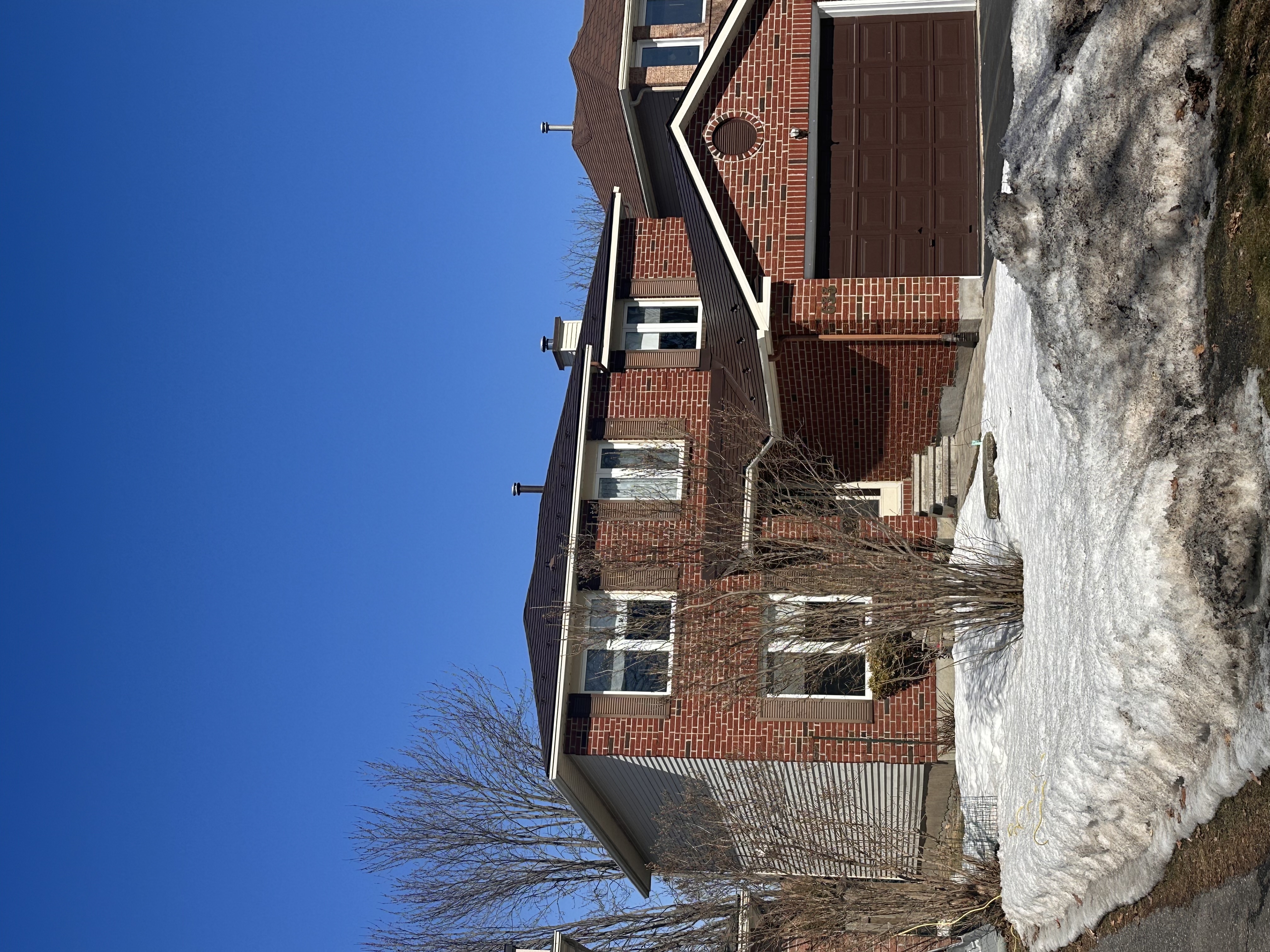 Interlock Aluminum Slate Metal Roofing – Colonial Brown | Ottawa, ON (Front-left elevation)