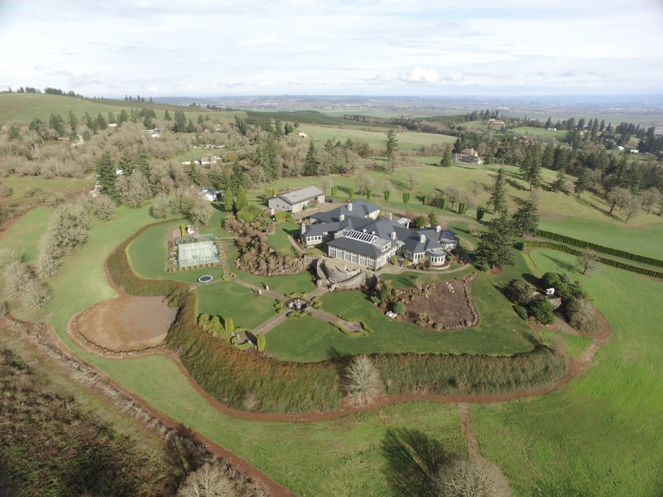 Deep Charcoal Interlock IB Membrane aluminum roof on a single-family home with a metal roof in a rural setting, Turner, Oregon