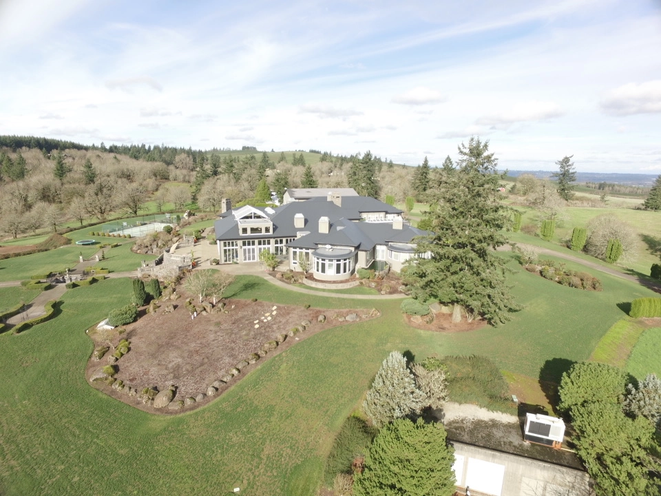 Deep Charcoal Interlock IB Membrane aluminum roof on a Deep Charcoal Interlock metal roof on a two-storey home, Turner, Oregon