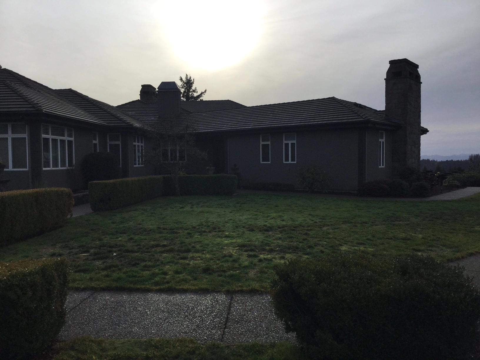 Before: a leaking concrete tile roof on the home, Turner, Oregon, ahead of a Deep Charcoal Interlock IB Membrane aluminum roof