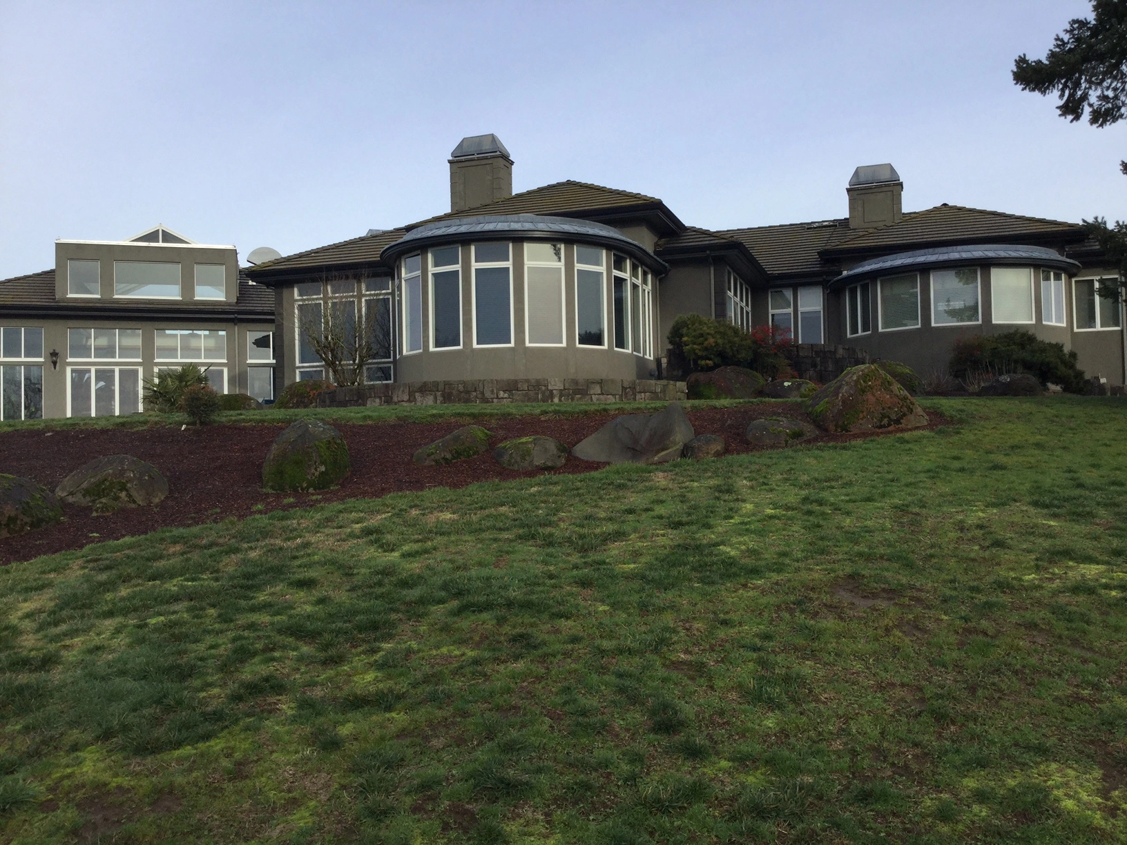 Before: a leaking concrete tile roof on the home, Turner, Oregon, ahead of a Deep Charcoal Interlock IB Membrane aluminum roof