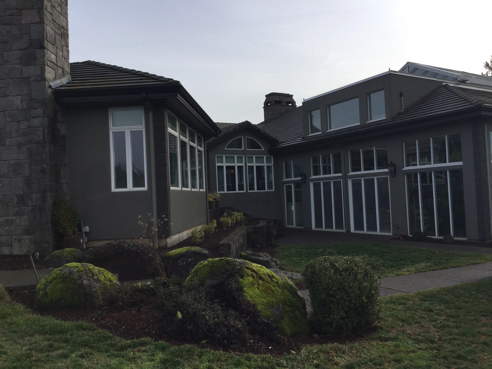 Before: a leaking concrete tile roof on the home, Turner, Oregon, ahead of a Deep Charcoal Interlock IB Membrane aluminum roof