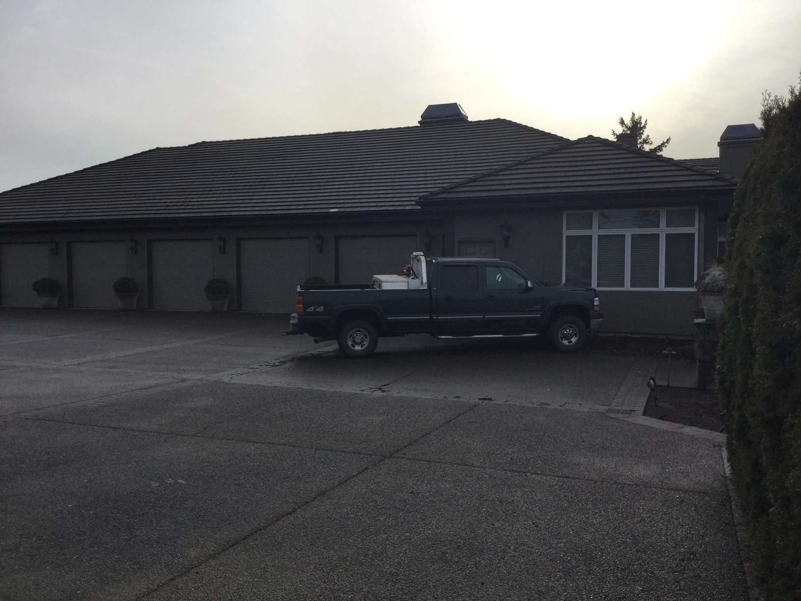 Before: a leaking concrete tile roof on the home, Turner, Oregon, ahead of a Deep Charcoal Interlock IB Membrane aluminum roof
