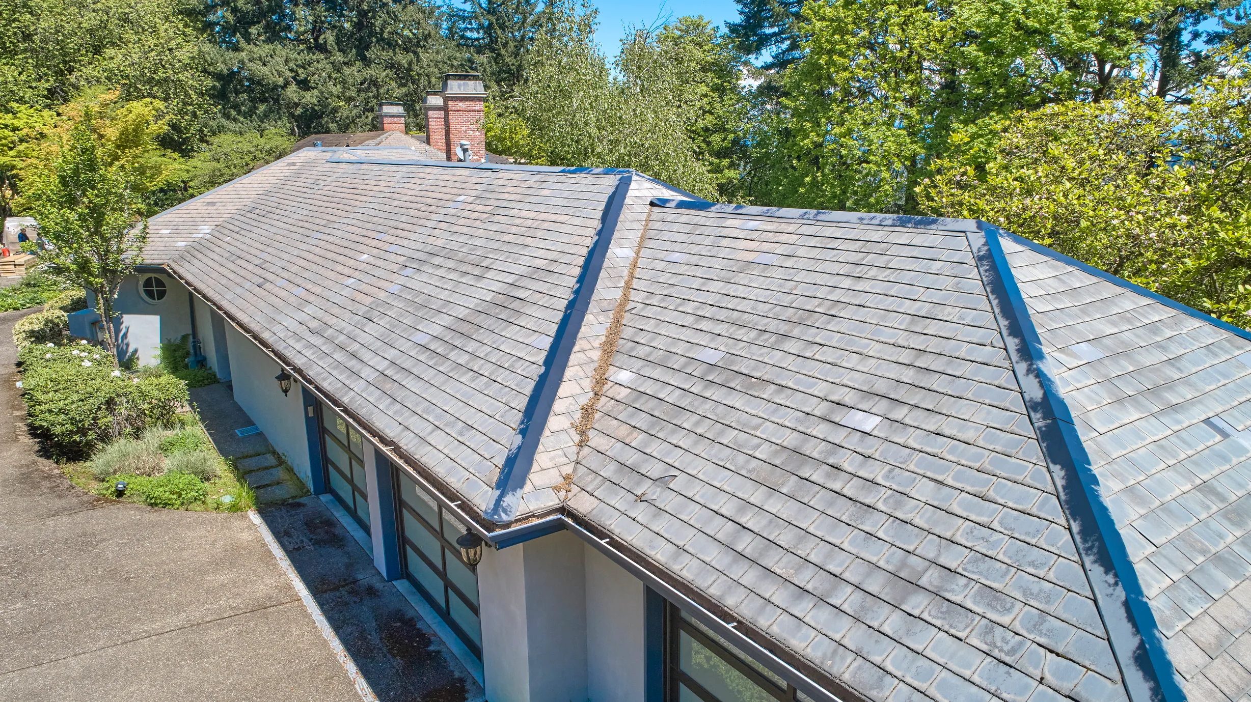 Before: a leaking natural slate roof on the home, Portland, Oregon, ahead of a Deep Charcoal Interlock Slate aluminum roof