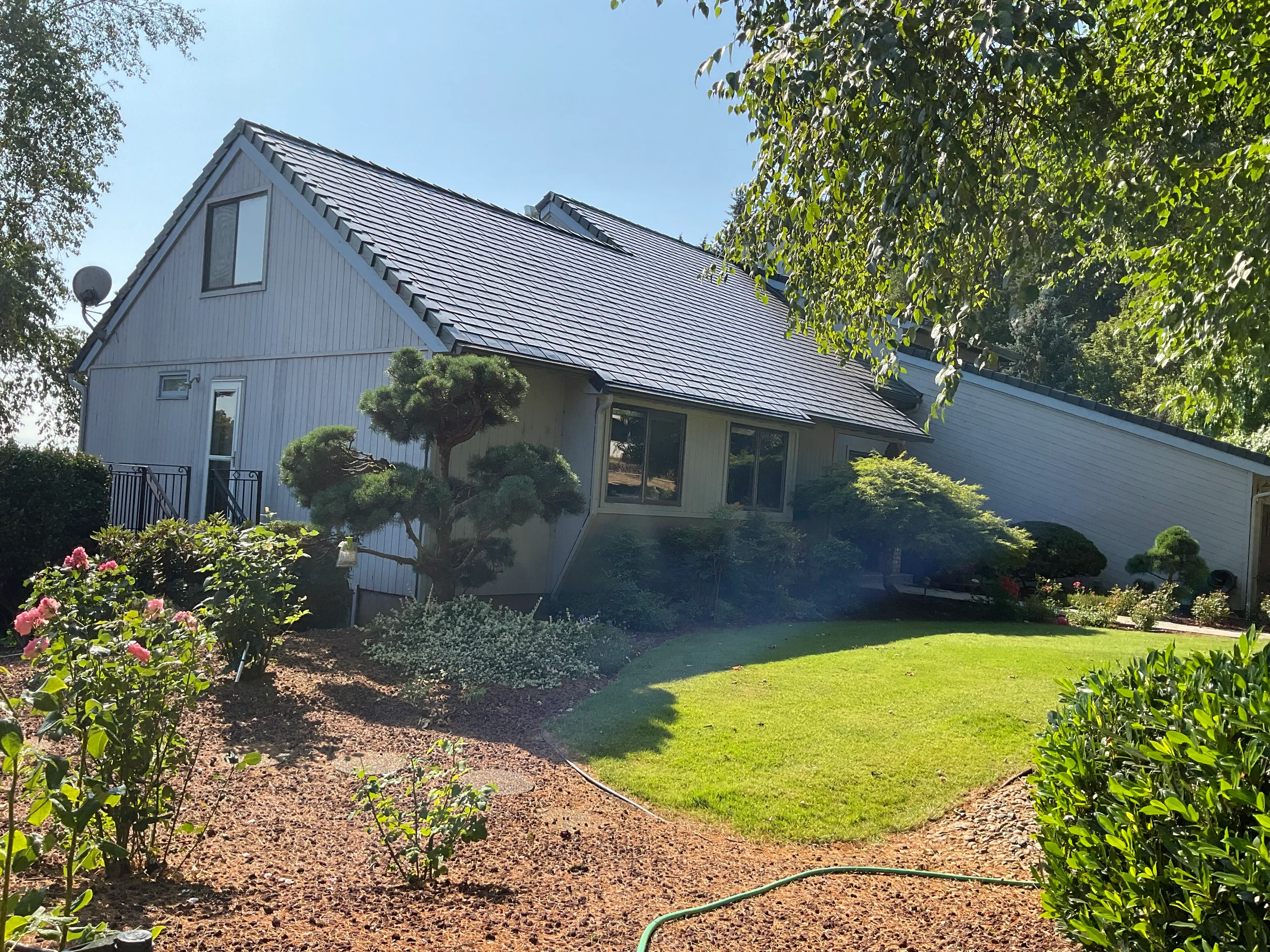 Deep Charcoal Interlock Slate aluminum roof on a Deep Charcoal Interlock Slate metal roof on a Ranch-style, Amity, Oregon