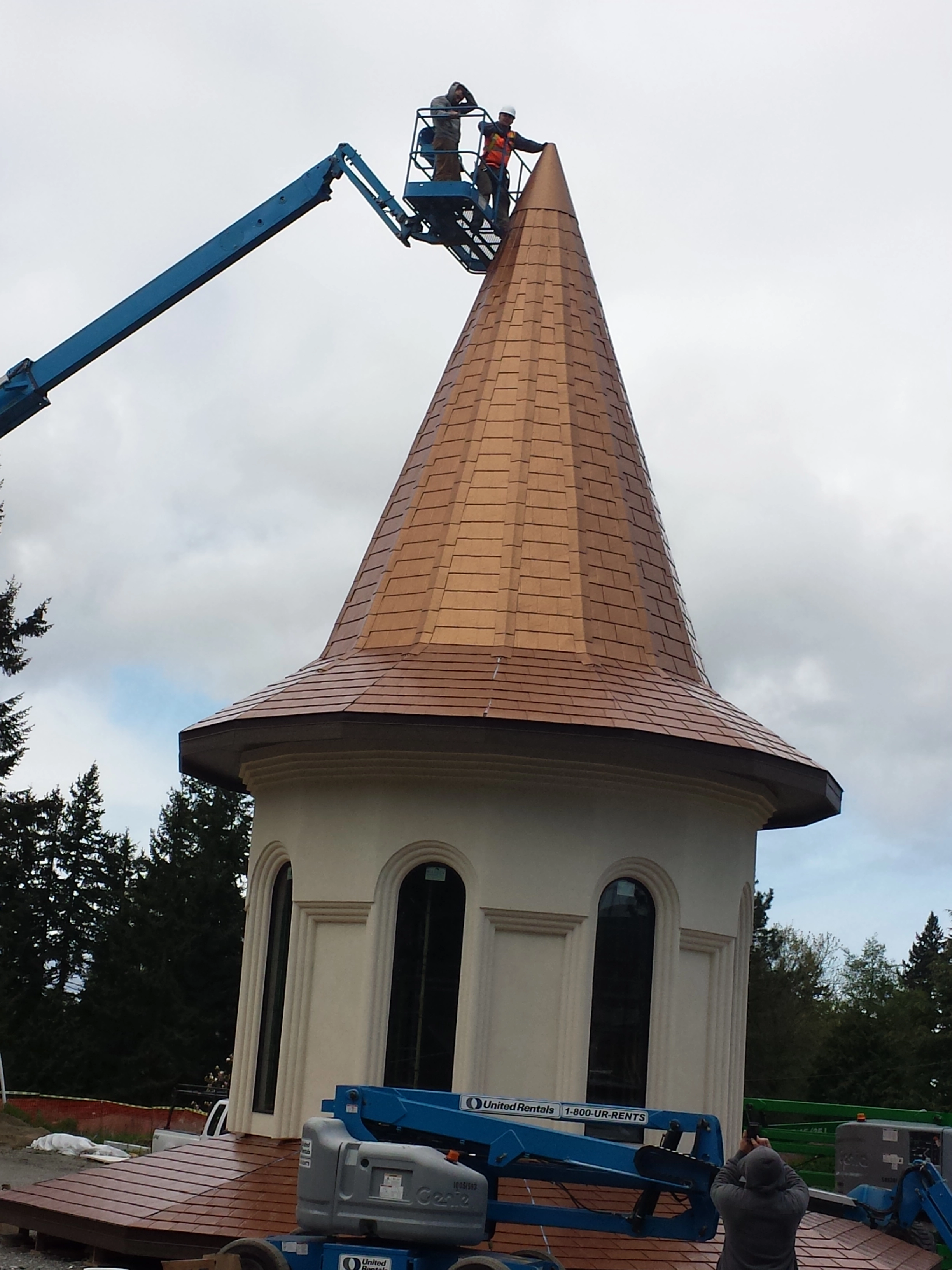 Aged Copper Interlock Slate aluminum roof being installed on the home, replacing new construction, Mountlake Terrace, Washington