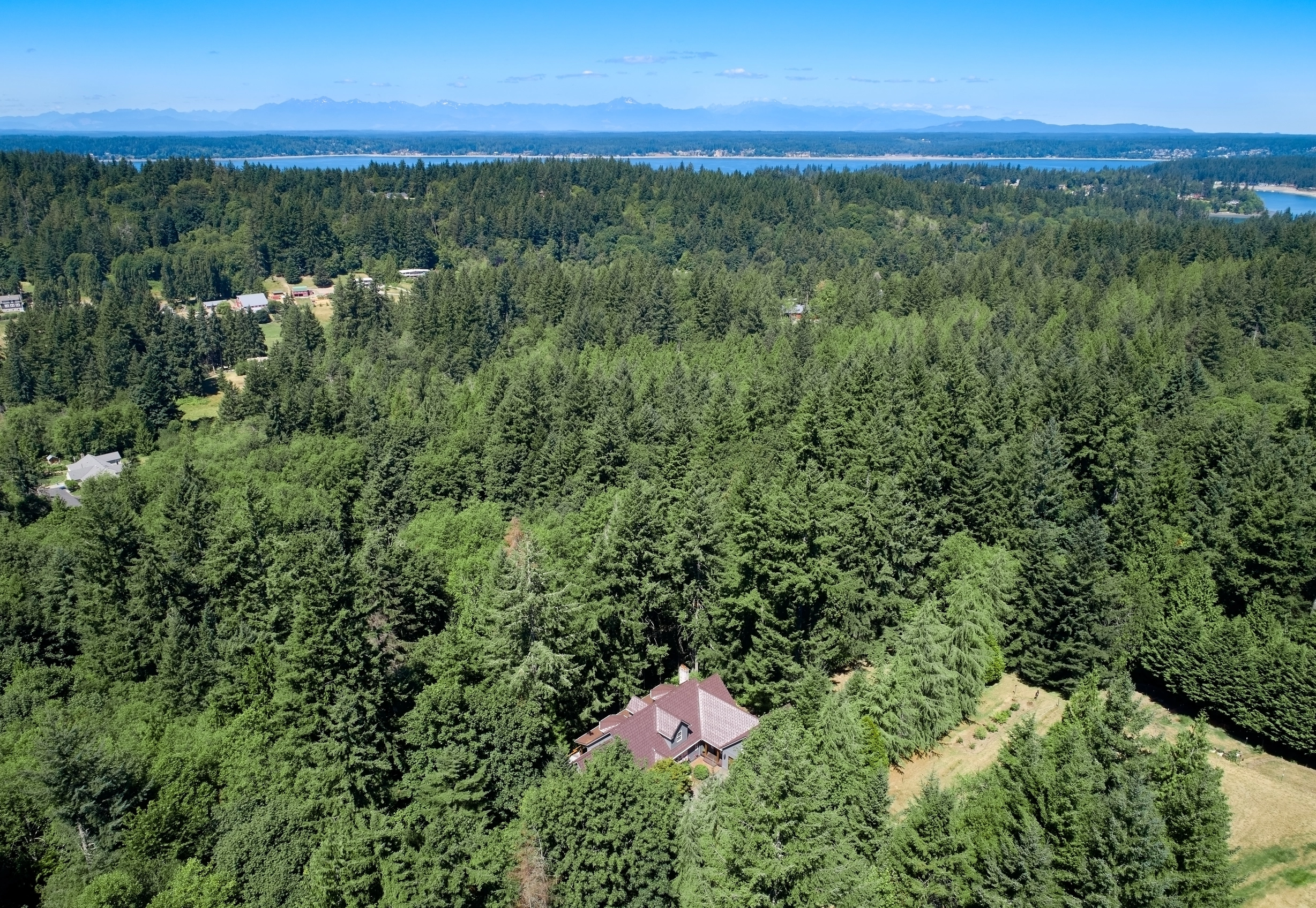 Colonial Brown Interlock Shake aluminum roof on a Colonial brown metal roof on a single-family home in a, Gig Harbor, Washington