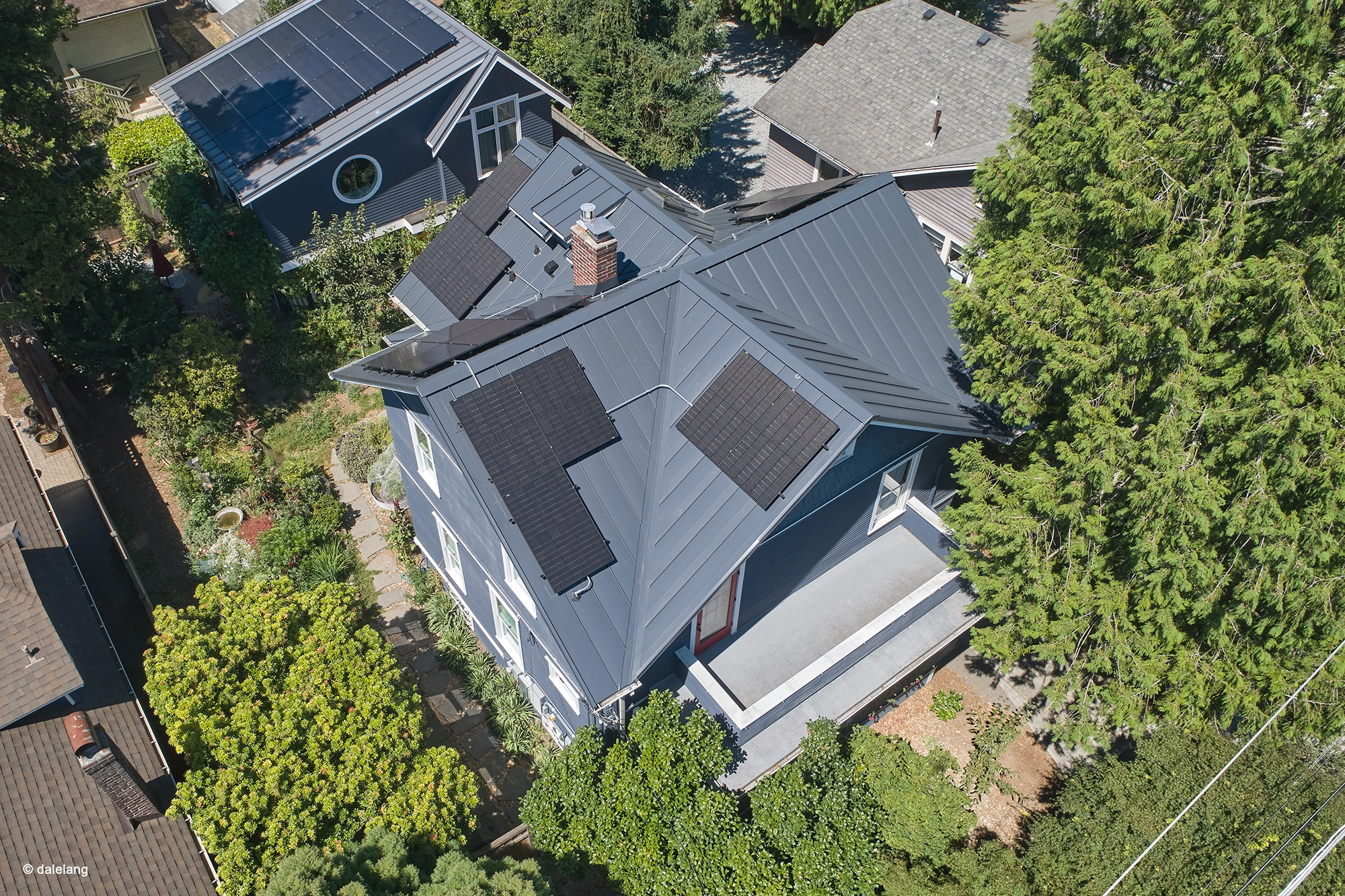 Deep Charcoal Interlock Standing Seam aluminum roof on a modern house with a deep charcoal metal roof in a, Seattle, Washington