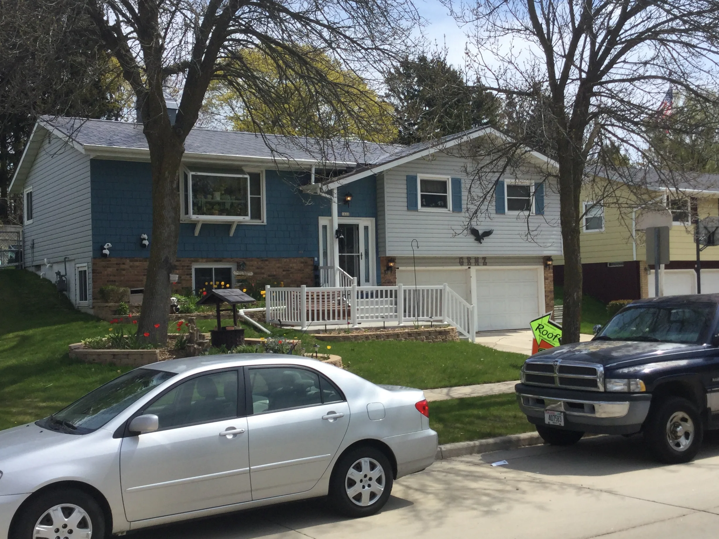 Weathered Interlock Slate aluminum roof on a two-storey home with dormers and a metal roof in a, Sheboygan, Wisconsin